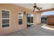 A covered patio offers outdoor living space in this private backyard, with desert landscaping at 341 Grapevine Rd, Mesquite, NV 89027