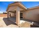 The covered patio offers shade and a relaxing space with views of the backyard at 341 Grapevine Rd, Mesquite, NV 89027