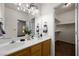 Bathroom features a double sink vanity and walk-in closet at 341 Grapevine Rd, Mesquite, NV 89027