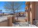 Cozy front porch with seating area offers views of the neighborhood and nearby mountains at 341 Grapevine Rd, Mesquite, NV 89027