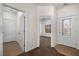 Hallway with tile and carpet flooring leads to other rooms at 341 Grapevine Rd, Mesquite, NV 89027