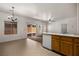 Open kitchen features ample counter space, appliances, tile floors, and access to the backyard at 341 Grapevine Rd, Mesquite, NV 89027