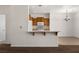 Open kitchen features a breakfast bar at 341 Grapevine Rd, Mesquite, NV 89027