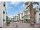 Inviting condo complex featuring multiple units with balconies and landscaped common areas under a bright, cloudy sky at 3550 Bay Sands Dr # 3064, Laughlin, NV 89029