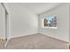 Serene bedroom with neutral carpet, large window and ample natural light at 3672 Angela Robin St # 206, Las Vegas, NV 89129