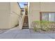 Exterior shot of building highlighting the front entrance and staircase at 3672 Angela Robin St # 206, Las Vegas, NV 89129