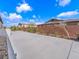 Expansive concrete driveway in backyard, perfect for recreation or extra parking at 380 Baratheon Ave, Las Vegas, NV 89183
