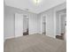 Neutral bedroom featuring plush carpeting, recessed lighting, and multiple entryways at 380 Baratheon Ave, Las Vegas, NV 89183