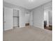 A light-filled bedroom featuring ensuite bathroom and walk-in closet at 380 Baratheon Ave, Las Vegas, NV 89183