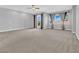 Spacious bedroom featuring neutral tones, large windows, and a ceiling fan at 380 Baratheon Ave, Las Vegas, NV 89183