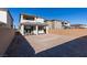Home exterior featuring a spacious backyard enclosed by brick walls and a covered patio perfect for outdoor enjoyment at 3921 Painted Lady Ave, Las Vegas, NV 89141