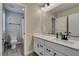 Bathroom with dual sink vanity and mirror at 3921 Painted Lady Ave, Las Vegas, NV 89141