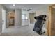 Upstairs bonus room with a treadmill and view of the second story at 3921 Painted Lady Ave, Las Vegas, NV 89141