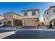 Well-maintained two-story home featuring a two-car garage, neatly landscaped front yard, and inviting curb appeal at 3921 Painted Lady Ave, Las Vegas, NV 89141