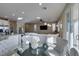 Open concept space featuring the dining area, kitchen, living room and patio access at 3921 Painted Lady Ave, Las Vegas, NV 89141