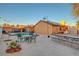 A large backyard featuring a well-maintained patio, pool area, and plenty of space for outdoor activities at 4055 Planetary Ln, Las Vegas, NV 89115