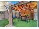 Stunning backyard gazebo featuring a bar area, seating, and a relaxing ambiance at 4055 Planetary Ln, Las Vegas, NV 89115