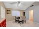 Dining area with table set for a meal, and modern light fixture at 4055 Planetary Ln, Las Vegas, NV 89115