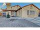 Single-story home showing desert landscaping, unique brick driveway, and well-maintained front exterior at 4055 Planetary Ln, Las Vegas, NV 89115