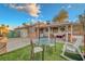 Beautiful backyard gazebo featuring a bar area, seating, and a relaxing ambiance at 4055 Planetary Ln, Las Vegas, NV 89115