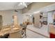 Open concept living, kitchen, and dining areas for easy entertaining at 4055 Planetary Ln, Las Vegas, NV 89115
