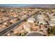 Enjoy an aerial perspective of the neighborhood, displaying well-kept homes and beautiful open space at 4141 Coburn St, North Las Vegas, NV 89032