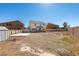A large vacant backyard, ready for landscaping, and with a storage shed and space for outdoor living at 4141 Coburn St, North Las Vegas, NV 89032