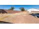 This backyard is large and has a shed in the back at 4141 Coburn St, North Las Vegas, NV 89032