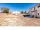 This backyard is large and has a shed in the back at 4141 Coburn St, North Las Vegas, NV 89032