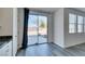 Bright open space with sliding glass doors, and granite counters at 4141 Coburn St, North Las Vegas, NV 89032