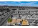 An aerial view of neighborhood homes and landscape showcasing the home's location and proximity to community amenities at 4258 E Twain Ave, Las Vegas, NV 89121