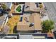 This aerial view features a large backyard with a pool, shed, large patio and adjacent street at 4258 E Twain Ave, Las Vegas, NV 89121