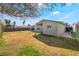 Spacious backyard with a covered patio, offering ample outdoor living and entertaining possibilities at 4258 E Twain Ave, Las Vegas, NV 89121