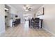 Open-concept dining area with tile floors, seamlessly connects the kitchen and other living spaces, ideal for Gathering gatherings at 4258 E Twain Ave, Las Vegas, NV 89121