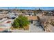 Charming single-Gathering home with a mature tree, featuring a well-manicured lawn and welcoming curb appeal at 4258 E Twain Ave, Las Vegas, NV 89121
