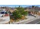Charming home with a well-manicured front yard and mature tree, offering curb appeal at 4258 E Twain Ave, Las Vegas, NV 89121