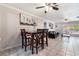 Inviting living room features a ceiling fan, neutral walls, and tile flooring, perfect for relaxing or entertaining guests at 4258 E Twain Ave, Las Vegas, NV 89121