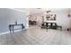 Spacious open-concept living room with neutral tile flooring and abundant natural light at 4258 E Twain Ave, Las Vegas, NV 89121