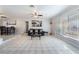 Expansive living room featuring neutral tile flooring and a seamless transition to the dining area at 4258 E Twain Ave, Las Vegas, NV 89121