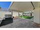 Inviting backyard with a covered patio and a built-in grill at 4804 El Tesoro Ave, Las Vegas, NV 89121
