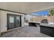 Covered patio with a grill, perfect for outdoor cooking at 4804 El Tesoro Ave, Las Vegas, NV 89121