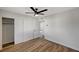 Bedroom showcasing wood-look floors and a closet at 4804 El Tesoro Ave, Las Vegas, NV 89121