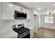 Updated kitchen with stainless steel appliances and sleek countertops at 4804 El Tesoro Ave, Las Vegas, NV 89121