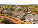 Aerial view of homes with desert landscaping and solar panels on the roofs at 5009 Elm Grove Dr, Las Vegas, NV 89130