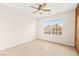 Bedroom featuring a ceiling fan and large window at 5009 Elm Grove Dr, Las Vegas, NV 89130
