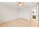 Bedroom featuring a ceiling fan, closet, and an open doorway to the bathroom at 5009 Elm Grove Dr, Las Vegas, NV 89130