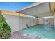 Covered back patio area, perfect for outdoor relaxing and entertaining at 602 Paloma Dr, Boulder City, NV 89005