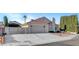 Charming single-story home with a two-car garage and private, gated driveway at 602 Paloma Dr, Boulder City, NV 89005