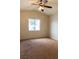 Bright bedroom with a ceiling fan and a window for natural light, perfect for a restful retreat at 629 Bright Lights Ave, North Las Vegas, NV 89031