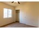 This cozy bedroom features a window for natural light and a closet for storage at 629 Bright Lights Ave, North Las Vegas, NV 89031